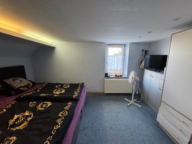 Schlafzimmer I im DG