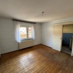 Schlafzimmer I mit Blick zum Bad