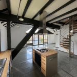 6 Blick von der Küche in den Wohnbereich