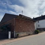 Ansicht des ehemaligen Ökonomieteils von der Straße