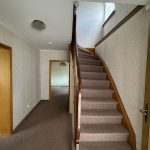 Hauseingangsbereich mit Treppenhaus
